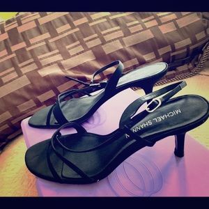 Black thin strap cloth like black heel shoes.